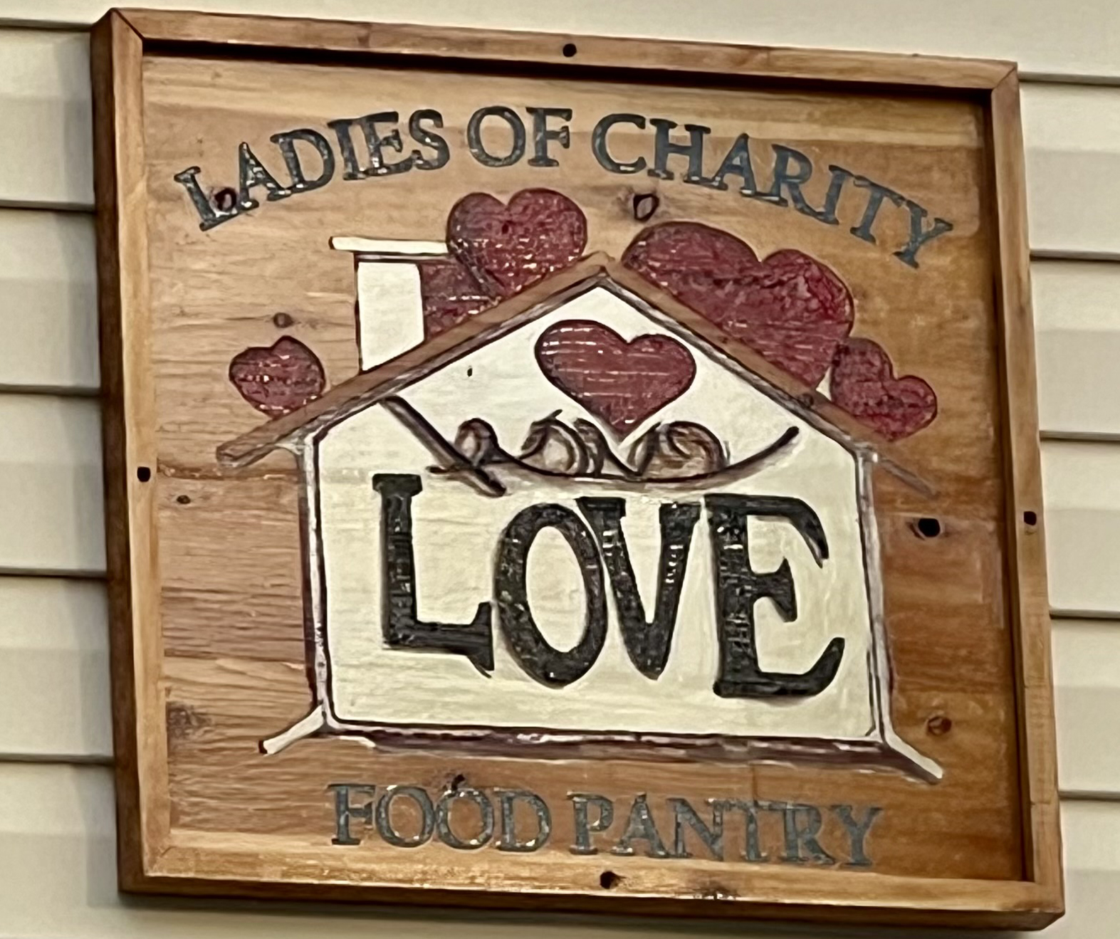 Ladies of Charity “Love” placard